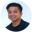 Photo of host Ivan smiling